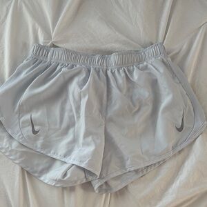Nike Women's Light Gray Athletic Shorts with Reflective Swoosh